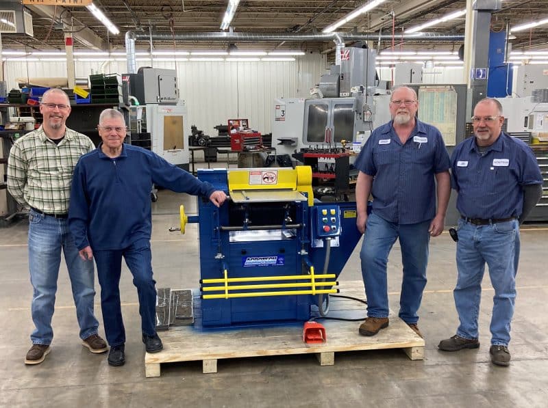 Andy Oliver (current owner), Dale Oliver (founding partner), Dale Gluesen (machine assembler) and Jim Schively (shop manager). 500 crop